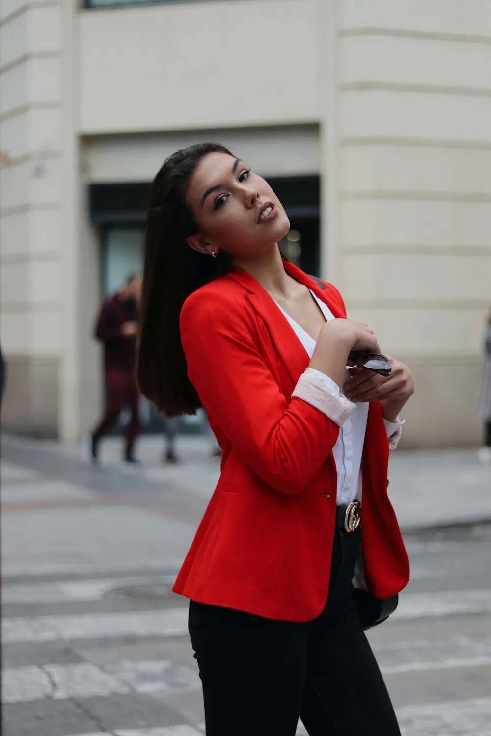 Street fashion portrait with a red blazer